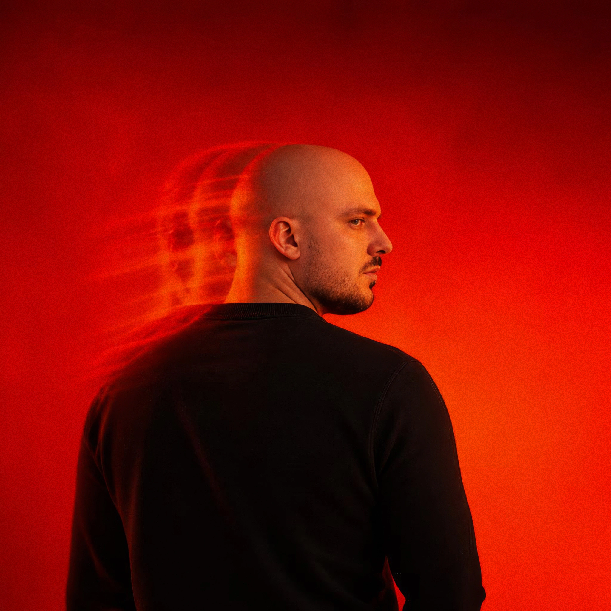 Artiom Kosenko, side portrait in red light